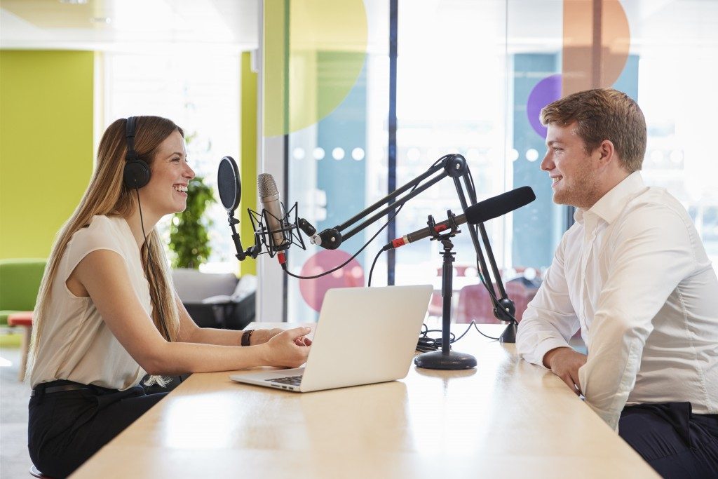 Man and woman having a radio conversation
